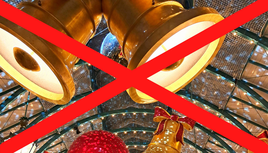 How to avoid Christmas in London: A photograph of the Covent Garden Christmas lights with a red cross through it